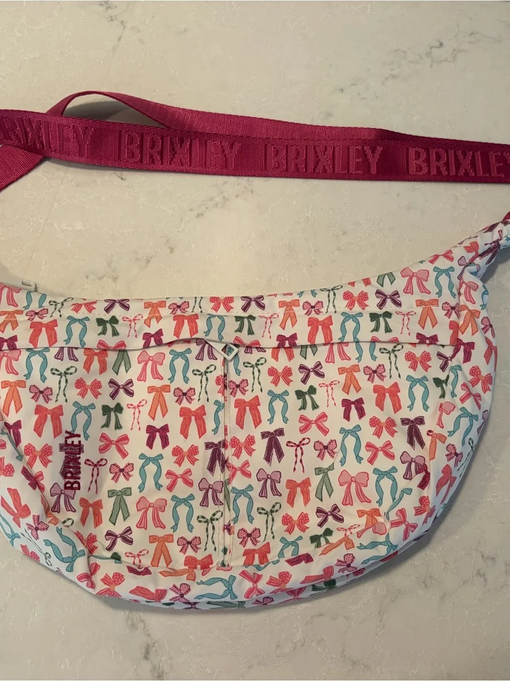 Brixley White Bow Print Bowie Cresent Crossbody Belt Bag